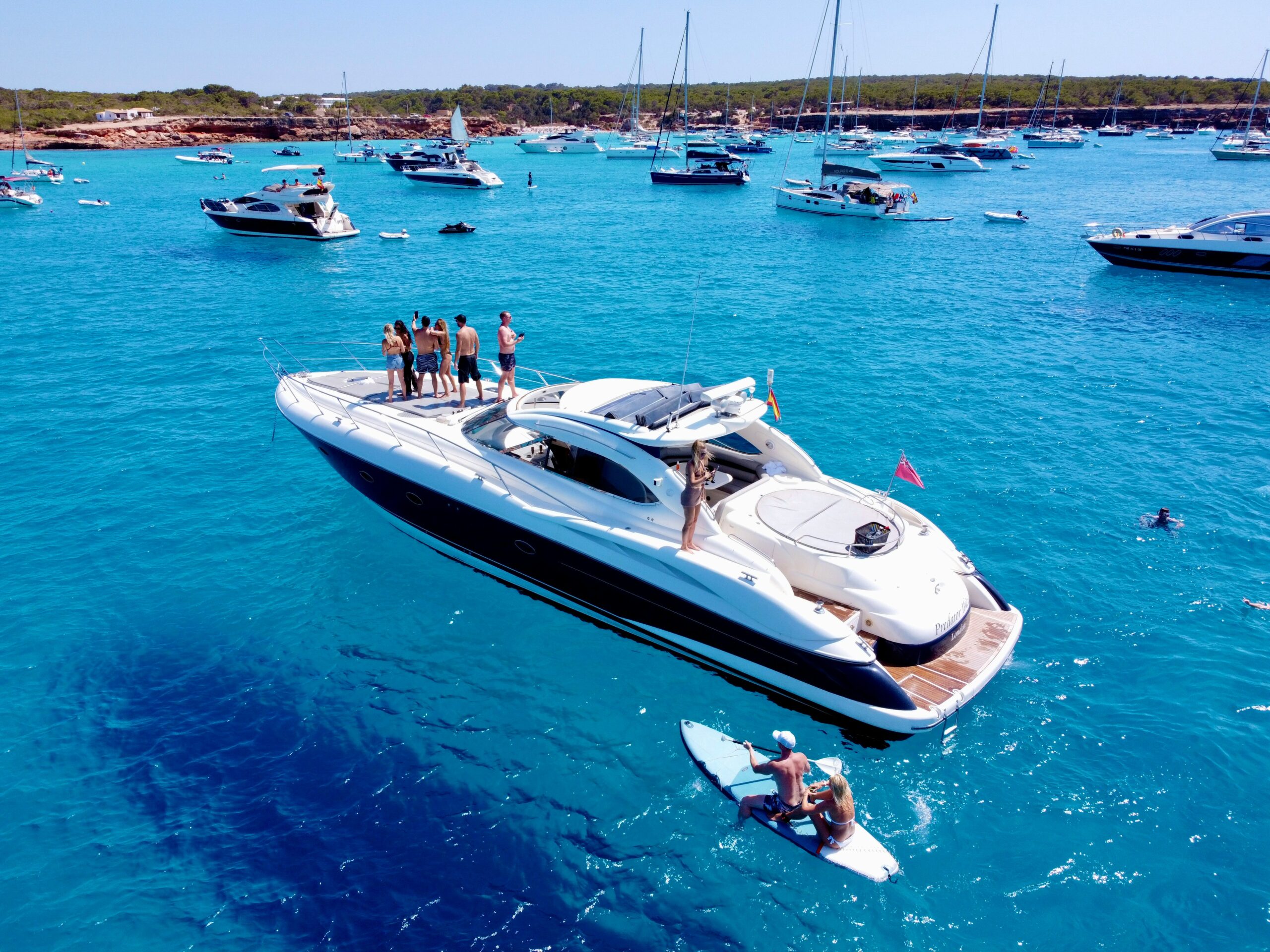Luxury motor yacht for charter in turquoise sea